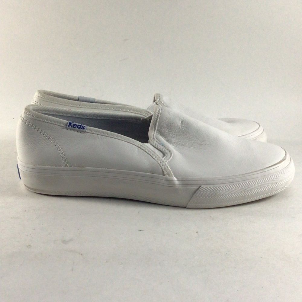 Keds White Slip-On Leather Sneakers with Subtle Blue Logo